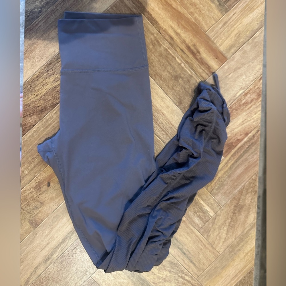 Cashel leggings in a slate ish color